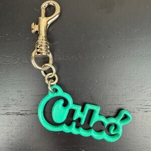 Chloe keychain bag charm in teal green. Vintage NEW, tags still attached